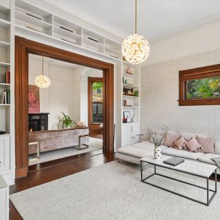 Twelve-foot ceilings and original woodwork in the living room