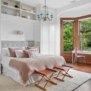 The primary suite, set into the bay window